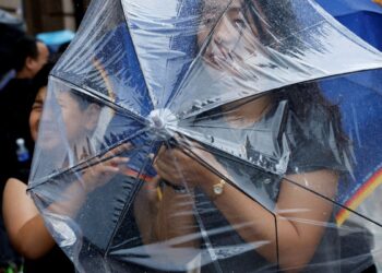 Chuva forte atinge Pequim durante passagem do tufão Dolphin